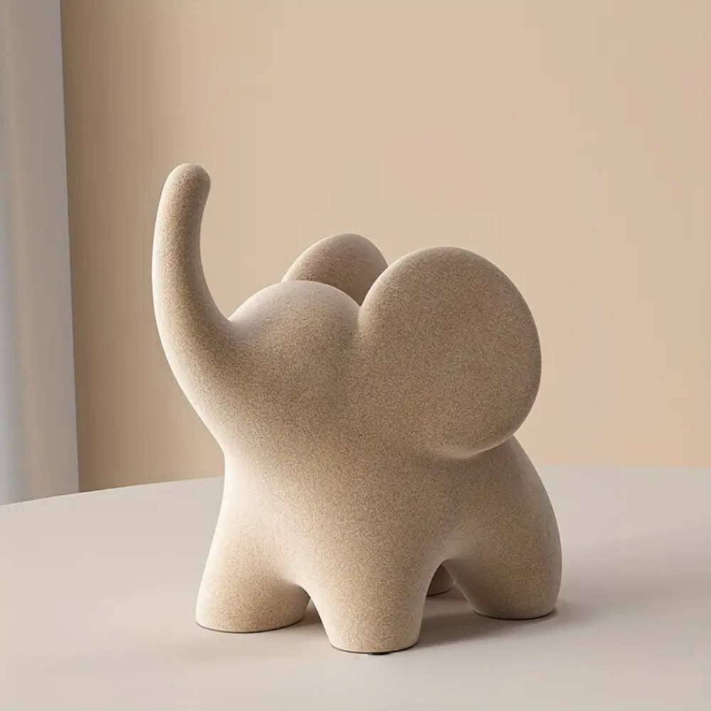 Figurine stylisée d’éléphant en résine avec finition velours floqué