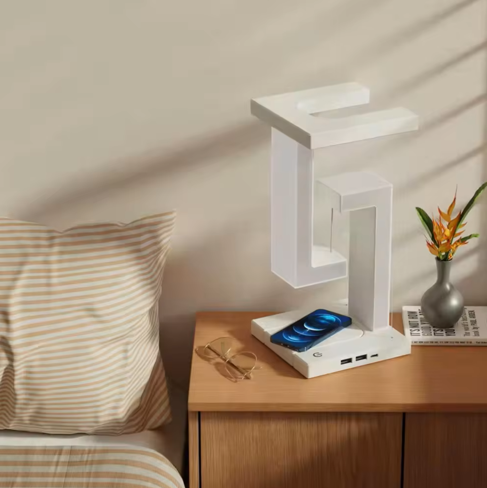 Lampe de table moderne avec design tensegrity flottant et station de charge sans fil