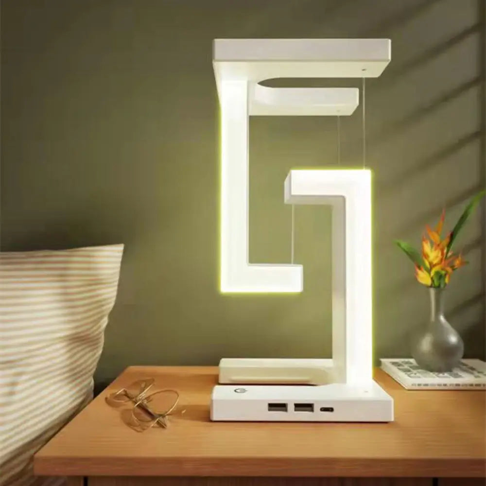 Lampe de table moderne avec design tensegrity flottant et station de charge sans fil