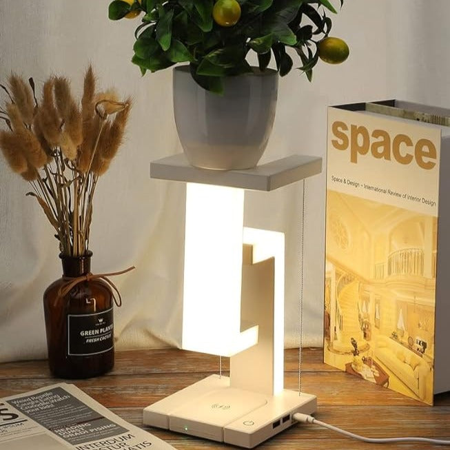 Lampe de table moderne avec design tensegrity flottant et station de charge sans fil