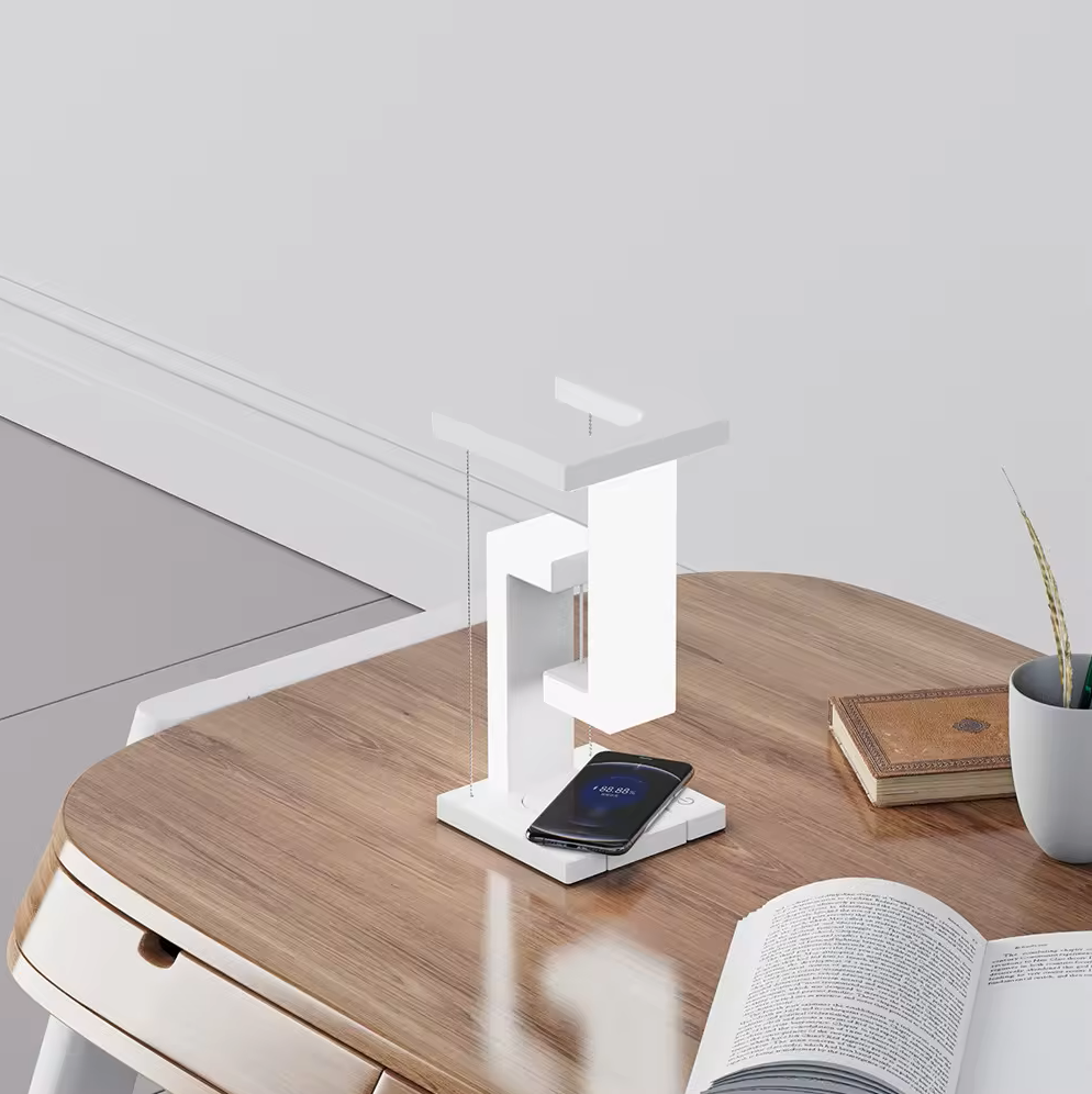 Lampe de table moderne avec design tensegrity flottant et station de charge sans fil