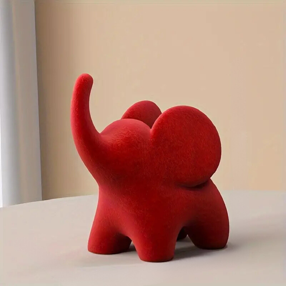 Figurine stylisée d’éléphant en résine avec finition velours floqué