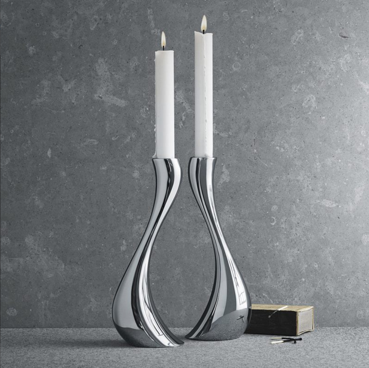 LumaWave – Luxe Chrome Candle Holders with Elegant Wave Shape