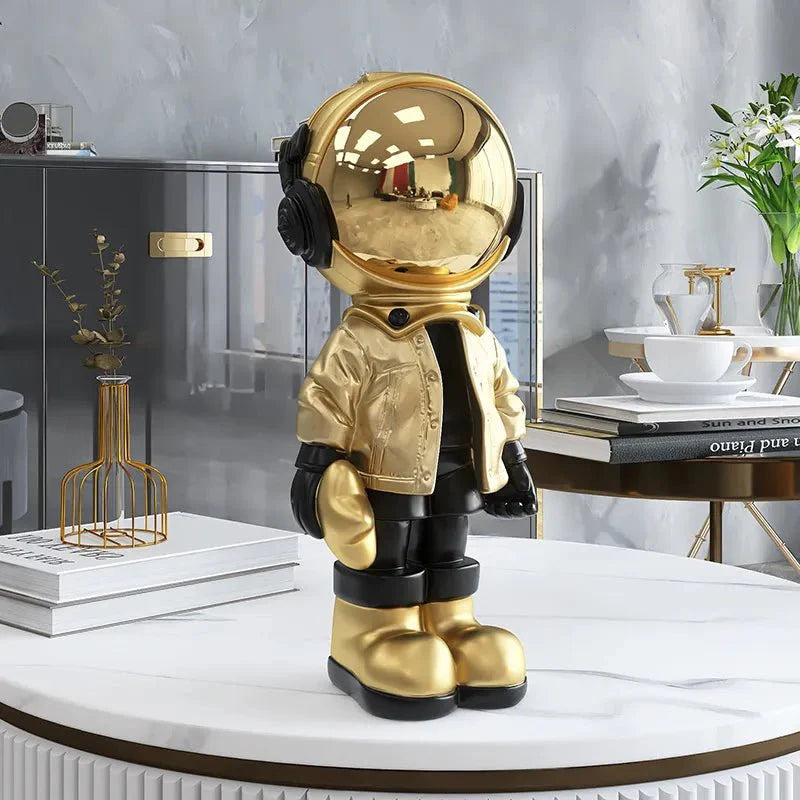 CosmoLuxe – Elegant Astronaut Statue with Gold Accents