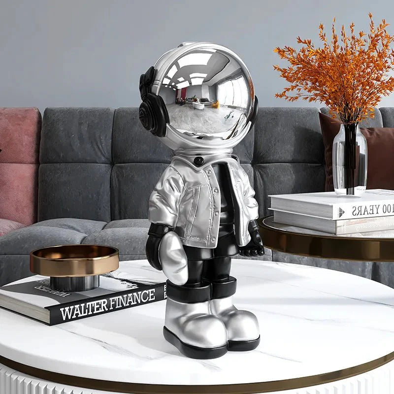CosmoLuxe – Elegant Astronaut Statue with Gold Accents